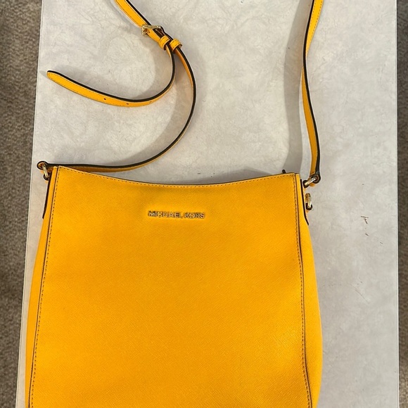 MICHAEL Michael Kors Handbags - Michael Kors
Michael Michael Kors Yellow Leather Jet Set Travel Messenger Bag